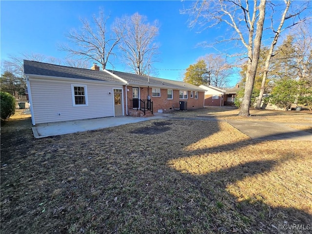 rear view of house with a patio area