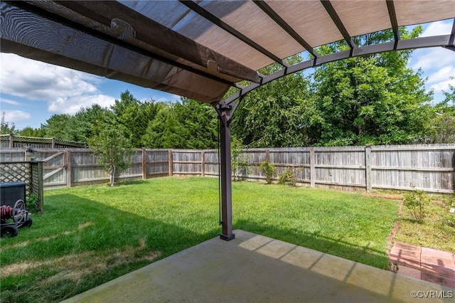 view of yard with a pergola and a patio area