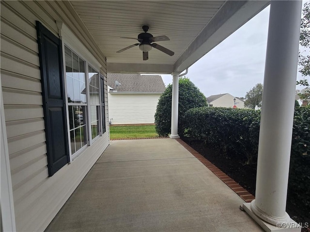 view of patio featuring ceiling fan