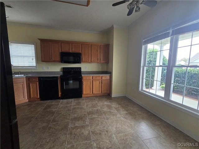 kitchen featuring ornamental molding, sink, ceiling fan, and black appliances