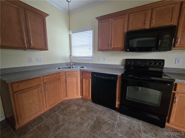 kitchen featuring pendant lighting, sink, ornamental molding, and black appliances