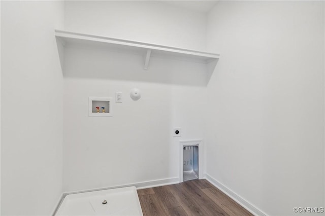 laundry area with washer hookup, hookup for a gas dryer, dark hardwood / wood-style floors, and hookup for an electric dryer