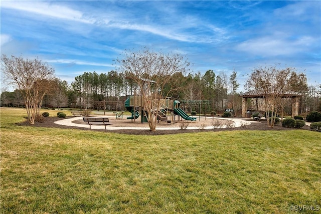 view of playground with a gazebo and a lawn