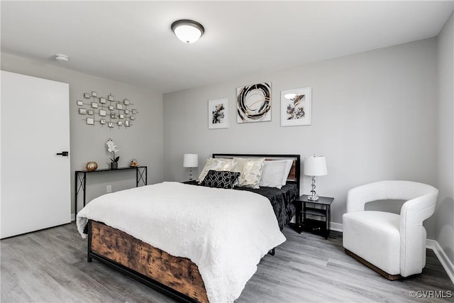 bedroom featuring hardwood / wood-style floors