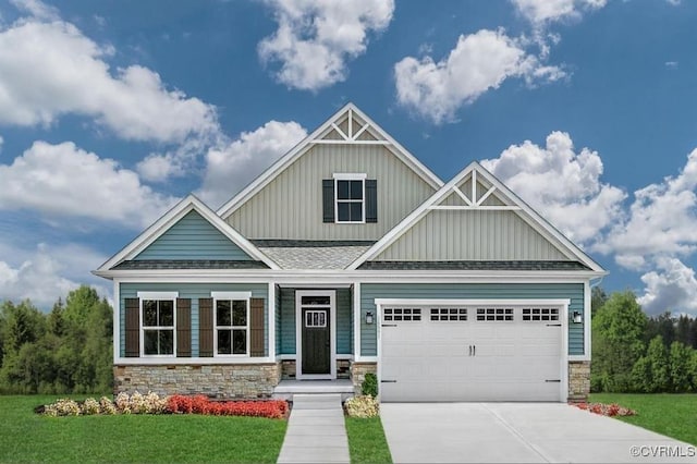 craftsman-style house with a garage and a front yard