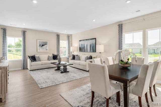 dining space featuring light hardwood / wood-style floors