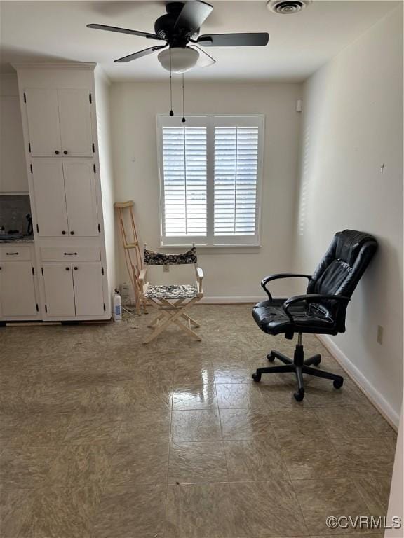 unfurnished room featuring ceiling fan