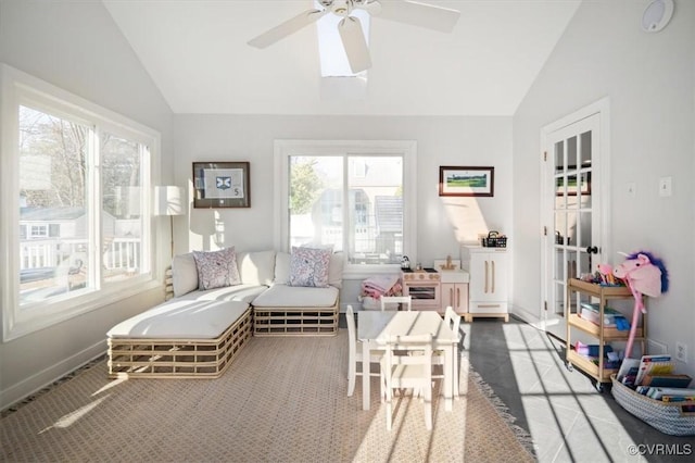 sunroom with vaulted ceiling and ceiling fan