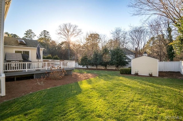 view of yard with a wooden deck