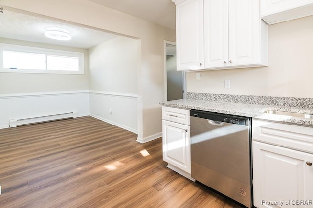 kitchen with white cabinetry, light hardwood / wood-style flooring, stainless steel dishwasher, and baseboard heating