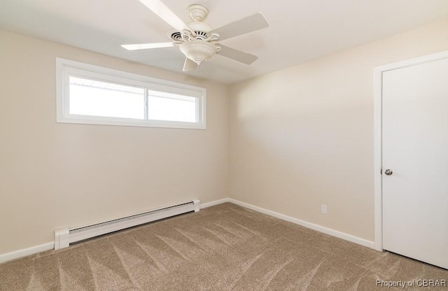 carpeted empty room featuring ceiling fan and baseboard heating