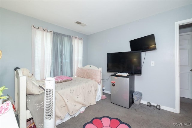 bedroom featuring carpet