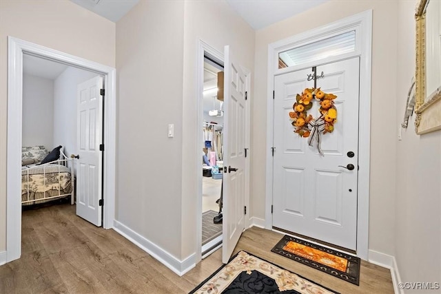 entrance foyer with light hardwood / wood-style flooring