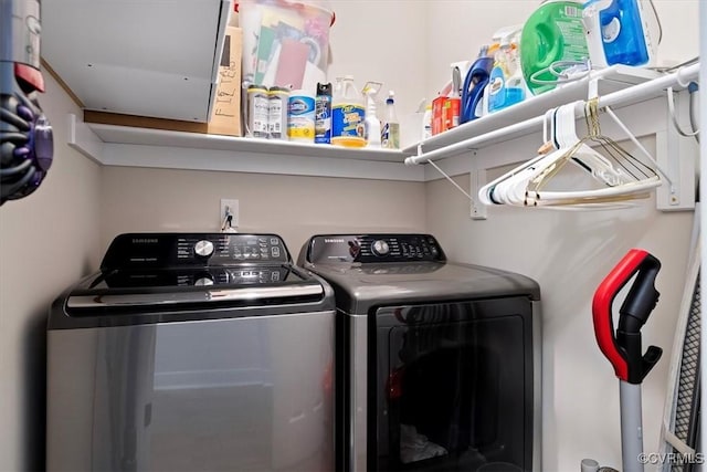 washroom featuring washer and dryer