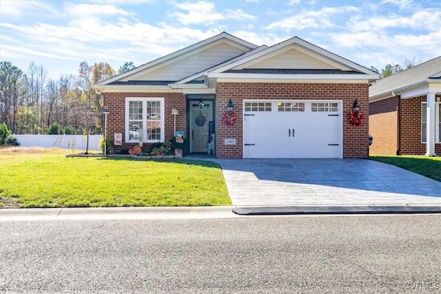 view of front of property with a garage and a front lawn