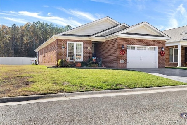 view of front of home with a garage and a front yard