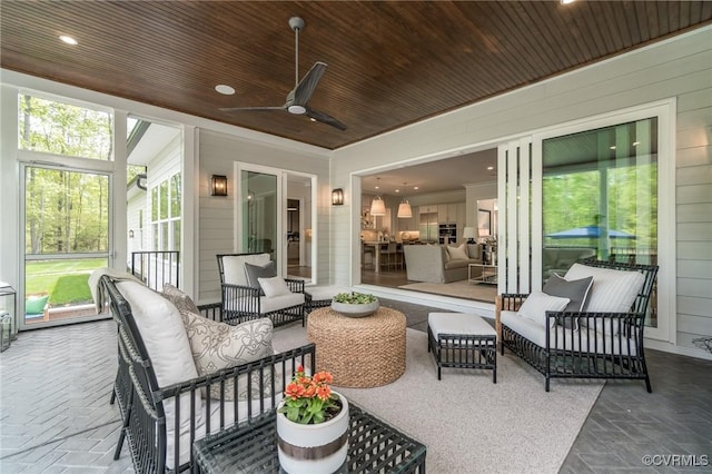 view of patio featuring outdoor lounge area and ceiling fan