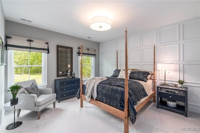 bedroom with light colored carpet