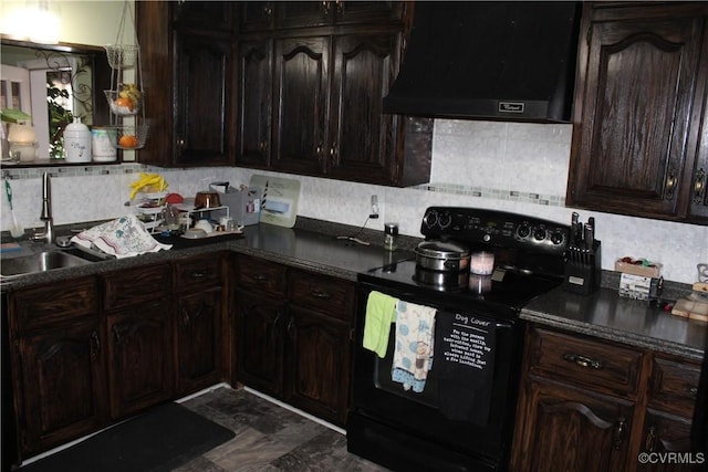 kitchen featuring black / electric stove, tasteful backsplash, sink, dark brown cabinetry, and wall chimney exhaust hood