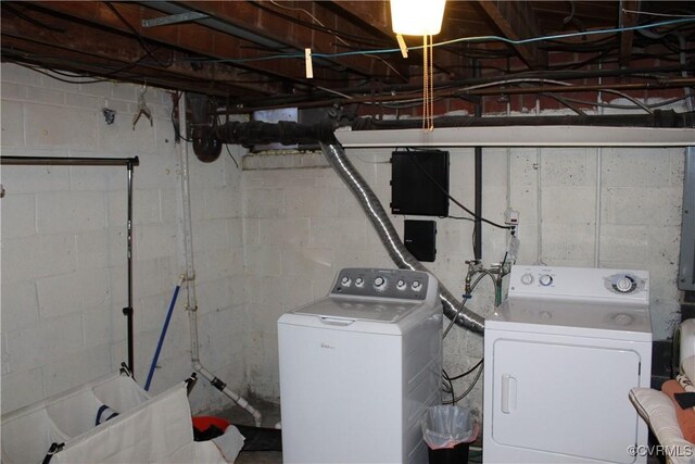 laundry area with separate washer and dryer