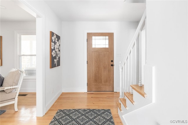 foyer featuring hardwood / wood-style floors