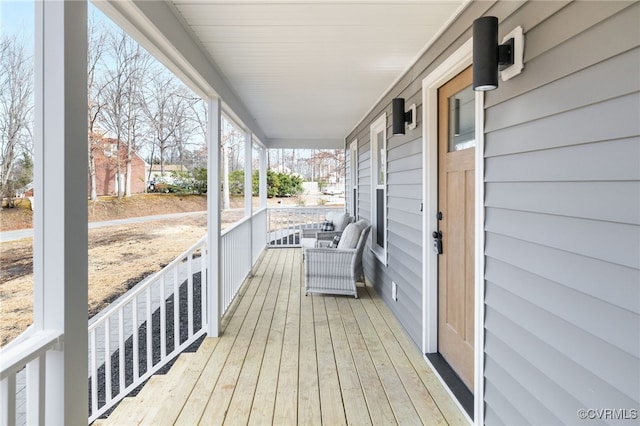 wooden deck featuring a porch