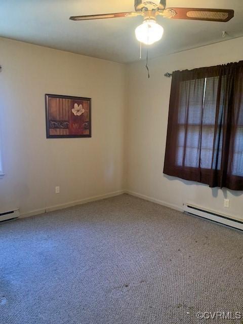 202 W York Dr, Emporia, VA 23847 - unfurnished room featuring ceiling fan, carpet flooring, and baseboard heating