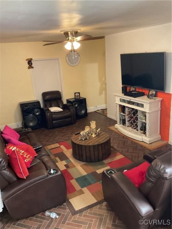 living room with ceiling fan