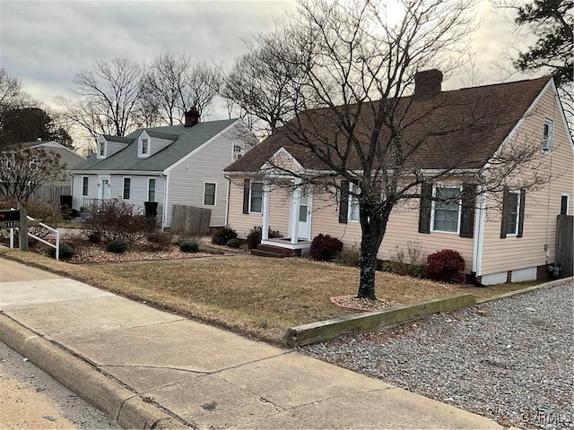 view of front of home with a front yard