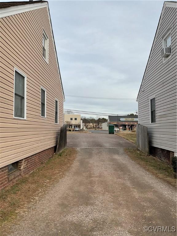 view of home's exterior featuring cooling unit