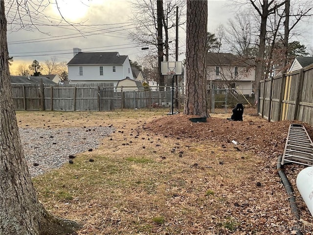 view of yard at dusk