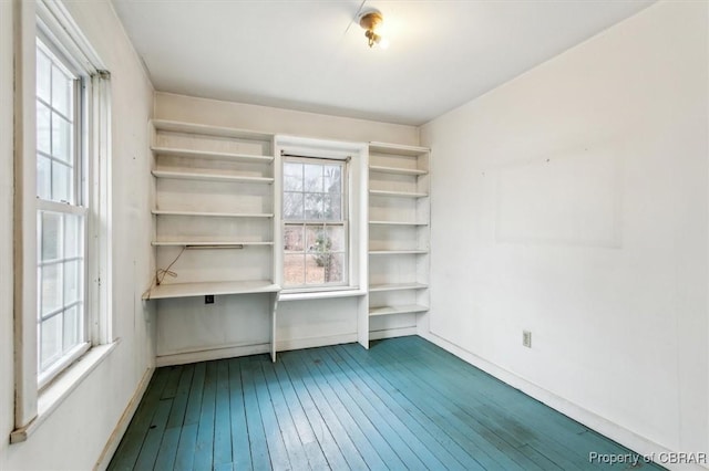 spare room featuring hardwood / wood-style flooring