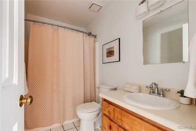 bathroom featuring walk in shower, tile patterned floors, vanity, and toilet