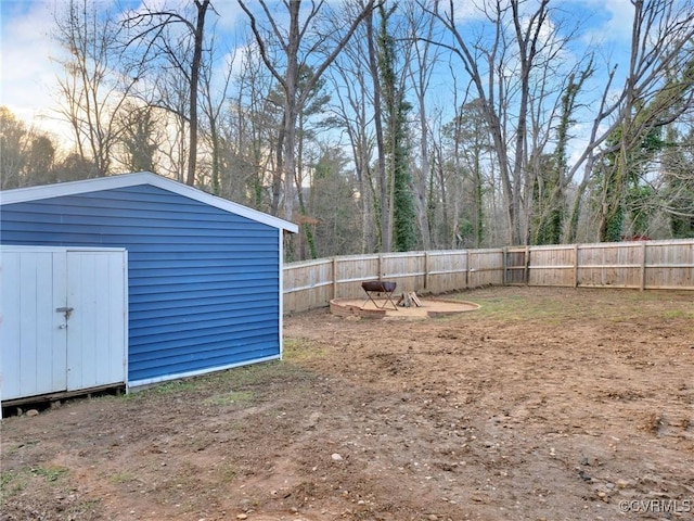 yard at dusk with a storage unit