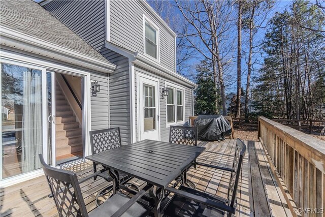 wooden terrace featuring grilling area