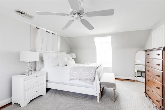 bedroom featuring lofted ceiling and ceiling fan