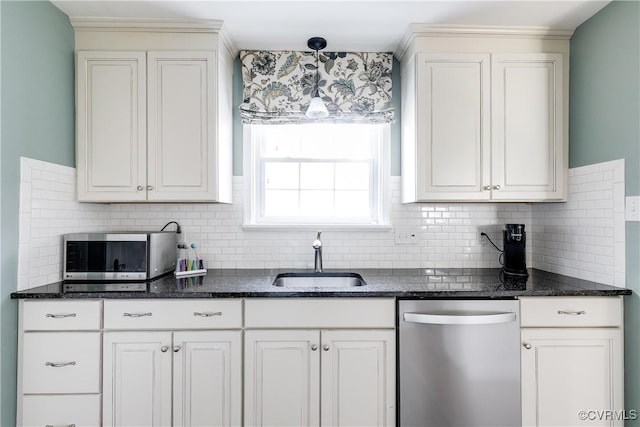 kitchen with white cabinetry, sink, and dishwasher