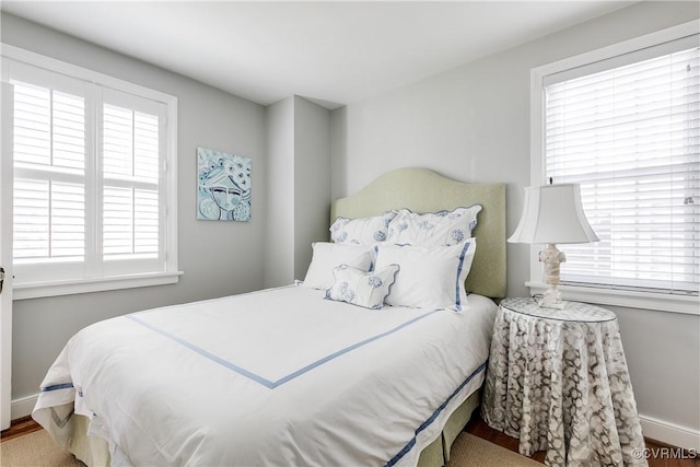 bedroom featuring hardwood / wood-style floors