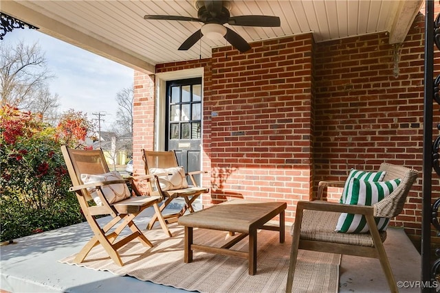 view of patio featuring ceiling fan