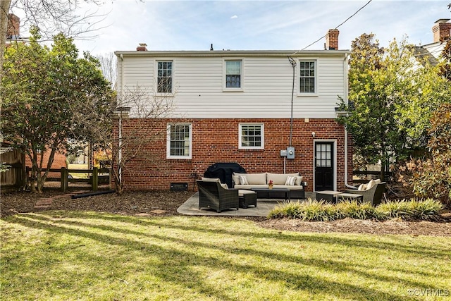 rear view of house with an outdoor hangout area and a lawn