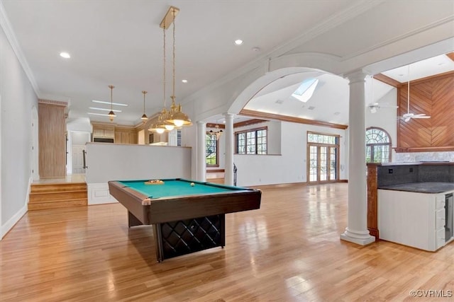 rec room with light wood-type flooring, ornate columns, and crown molding