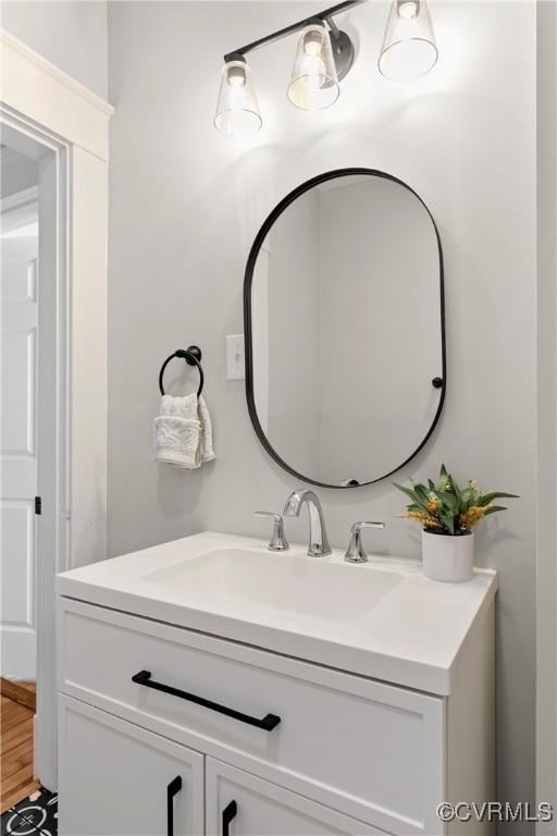 bathroom featuring vanity and hardwood / wood-style floors