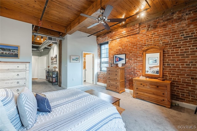 carpeted bedroom with brick wall, track lighting, wooden ceiling, and beam ceiling