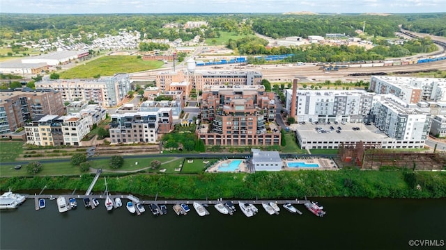 birds eye view of property featuring a water view