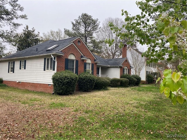 view of property exterior with a yard