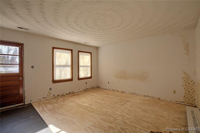 entrance foyer with a textured ceiling