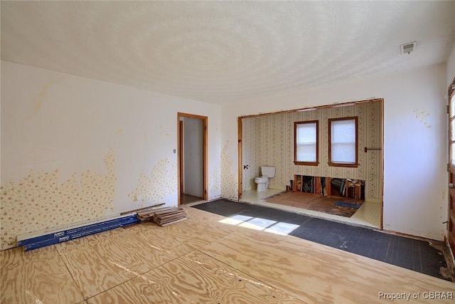 empty room featuring hardwood / wood-style floors