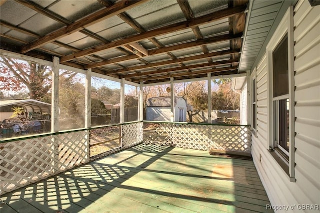 unfurnished sunroom featuring a healthy amount of sunlight