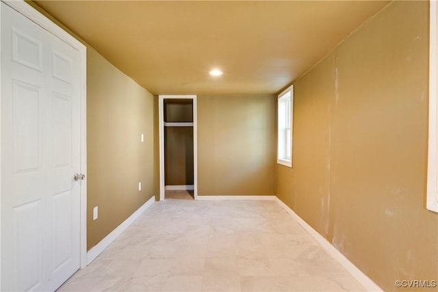 unfurnished bedroom with a closet