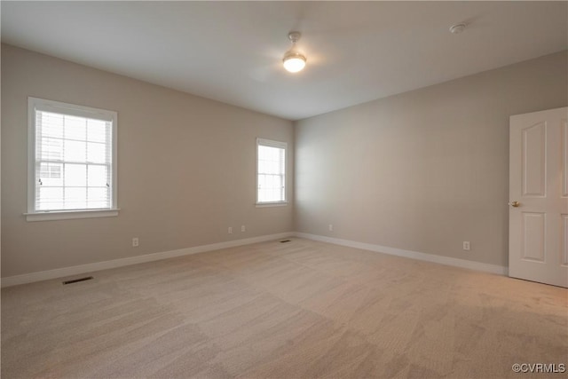 view of carpeted spare room